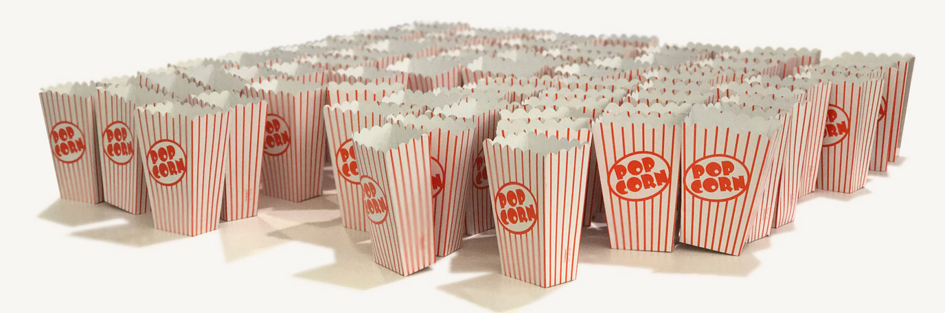 Table filled with boxes of popcorn