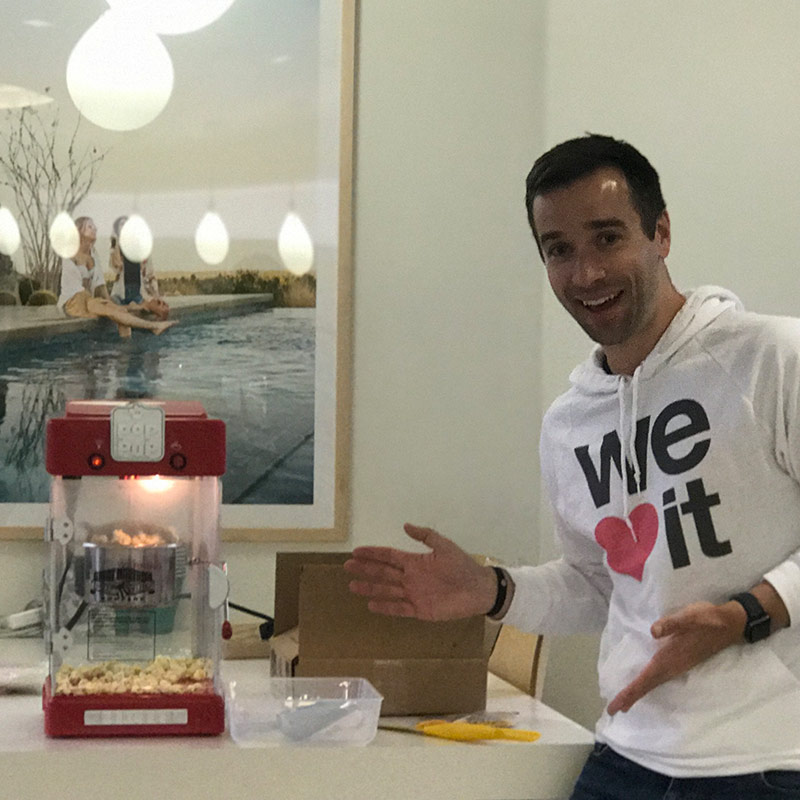 Stitch Fix employee presenting our new popcorn machine